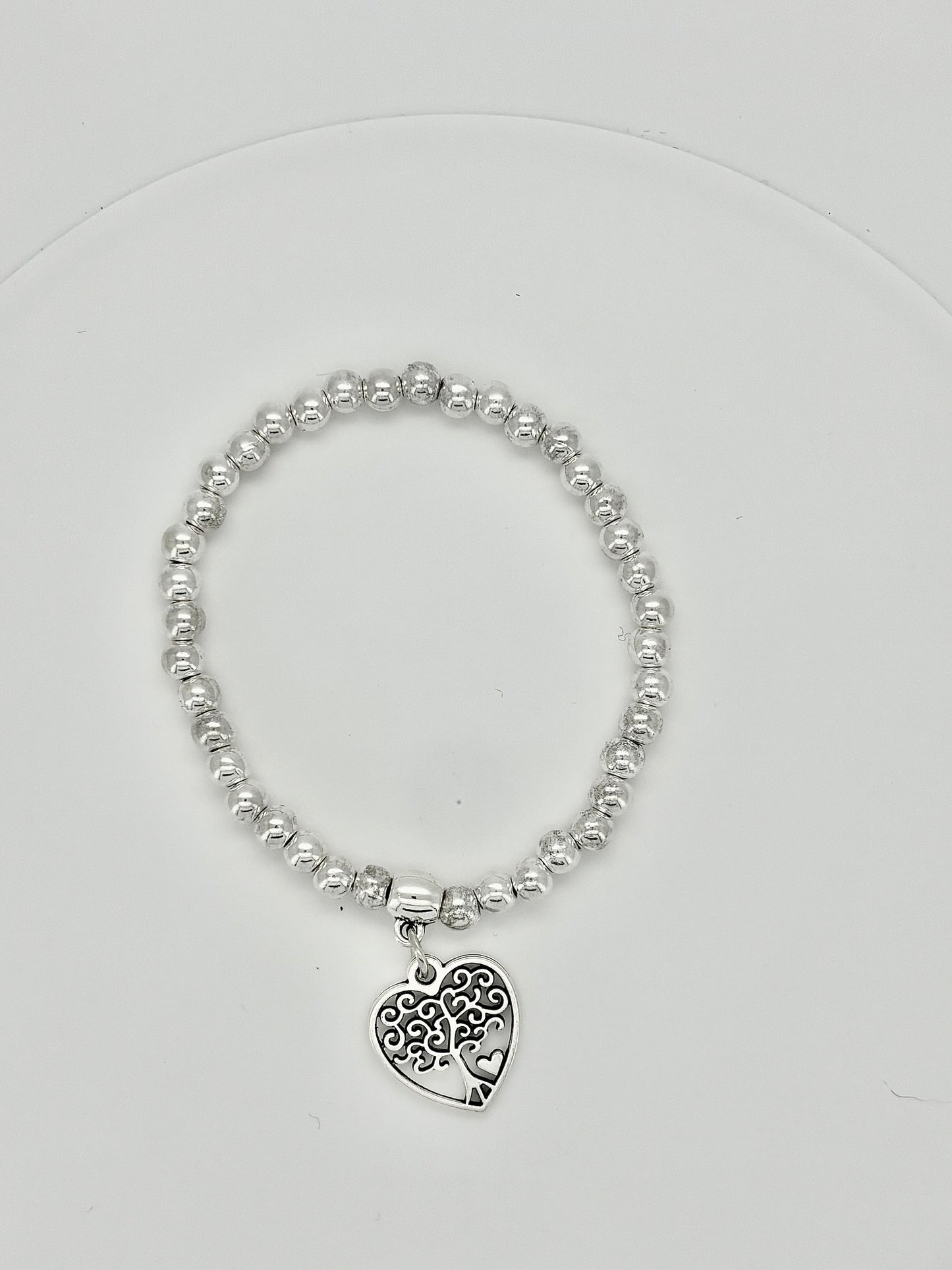 Charm beaded elasticelated  bracelets in silver Pxx