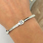 MARYbu square pave crystals and pearlescent detail stainless steel bangle