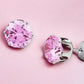 Pink hypoallergenic studs in silver tone